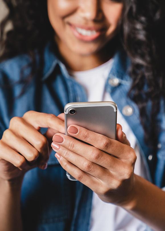 Woman scrolling through smartphone